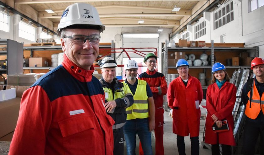 a group of people wearing hardhats and reflectors a group of people wearing hardhats and reflectors
