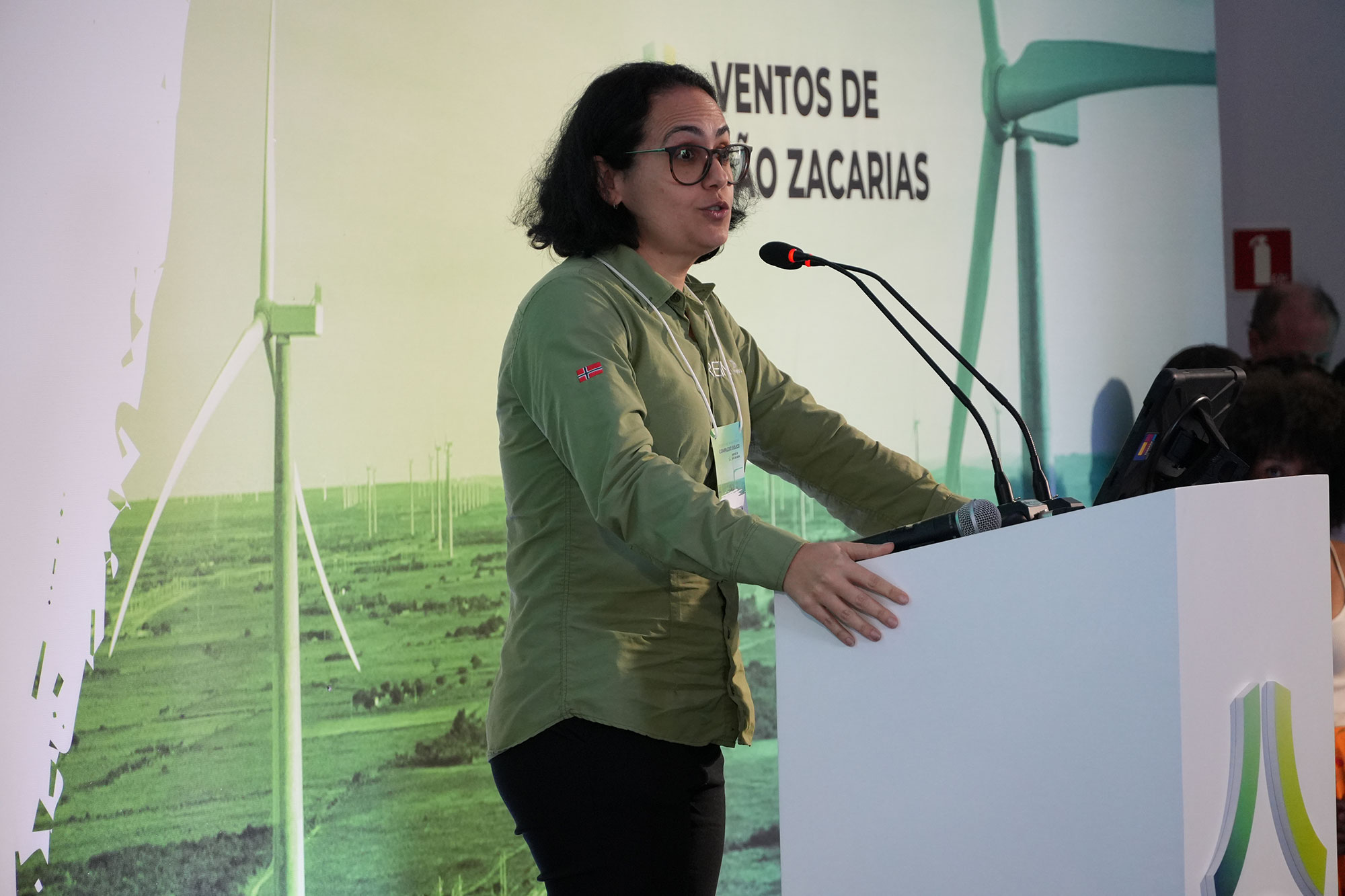 a person standing at a podium