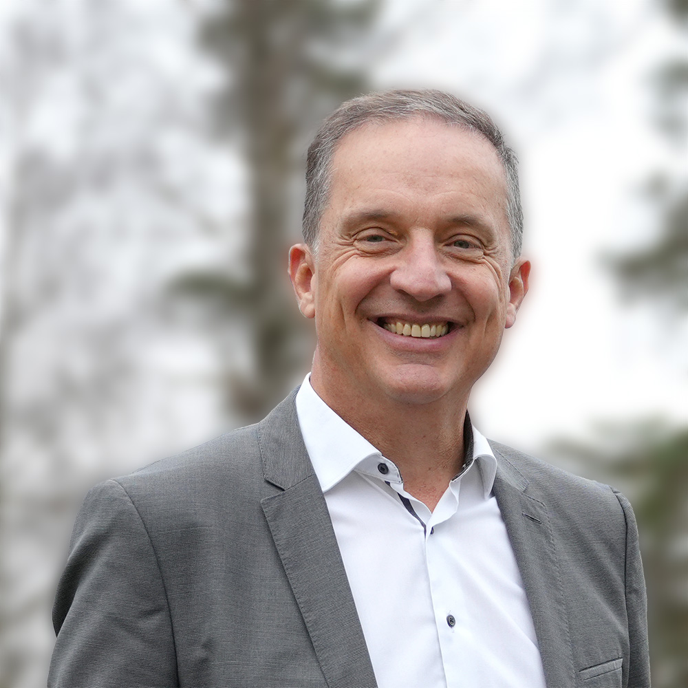 a man smiling for the camera